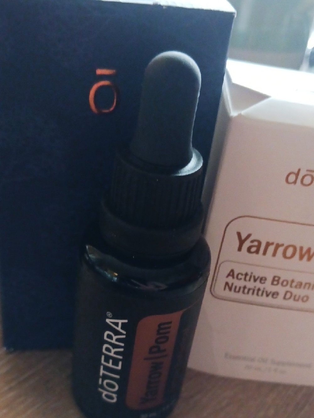 Doterra Facial Serum Bottle in Black and Brown Accents
